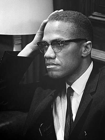 Malcolm X portrait in thought